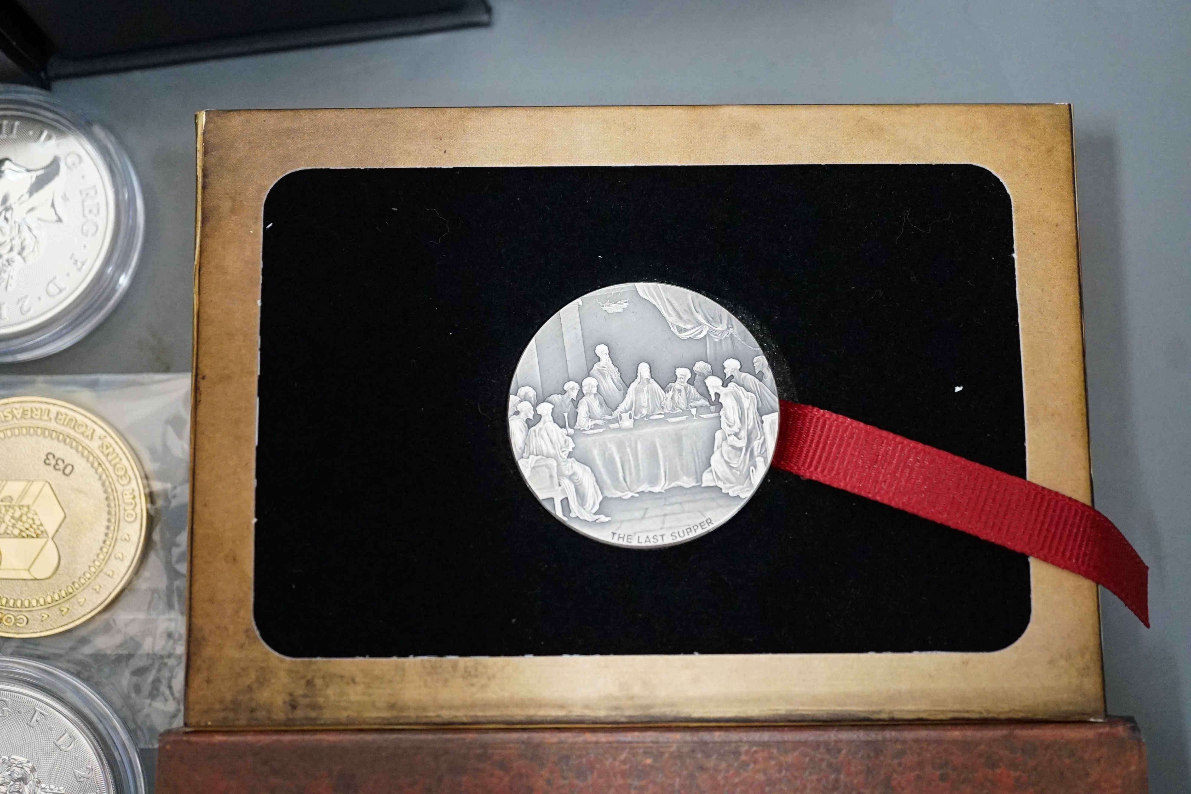 Ten bullion silver 1oz. commemorative coins, a bullion silver 2oz. coin and a Canada 2oz. silver ingot, BU